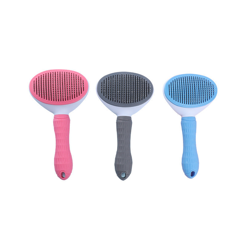 Cepillo autolimpieza para perros y gatos color azul rosa gris